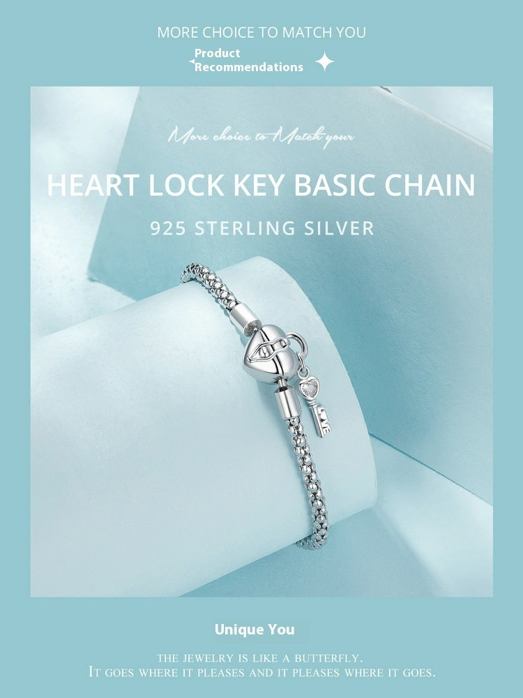 Braccialetto con base a chiave e lucchetto a cuore